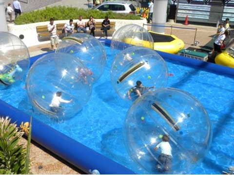 Large inflatable swimming pool with water ball